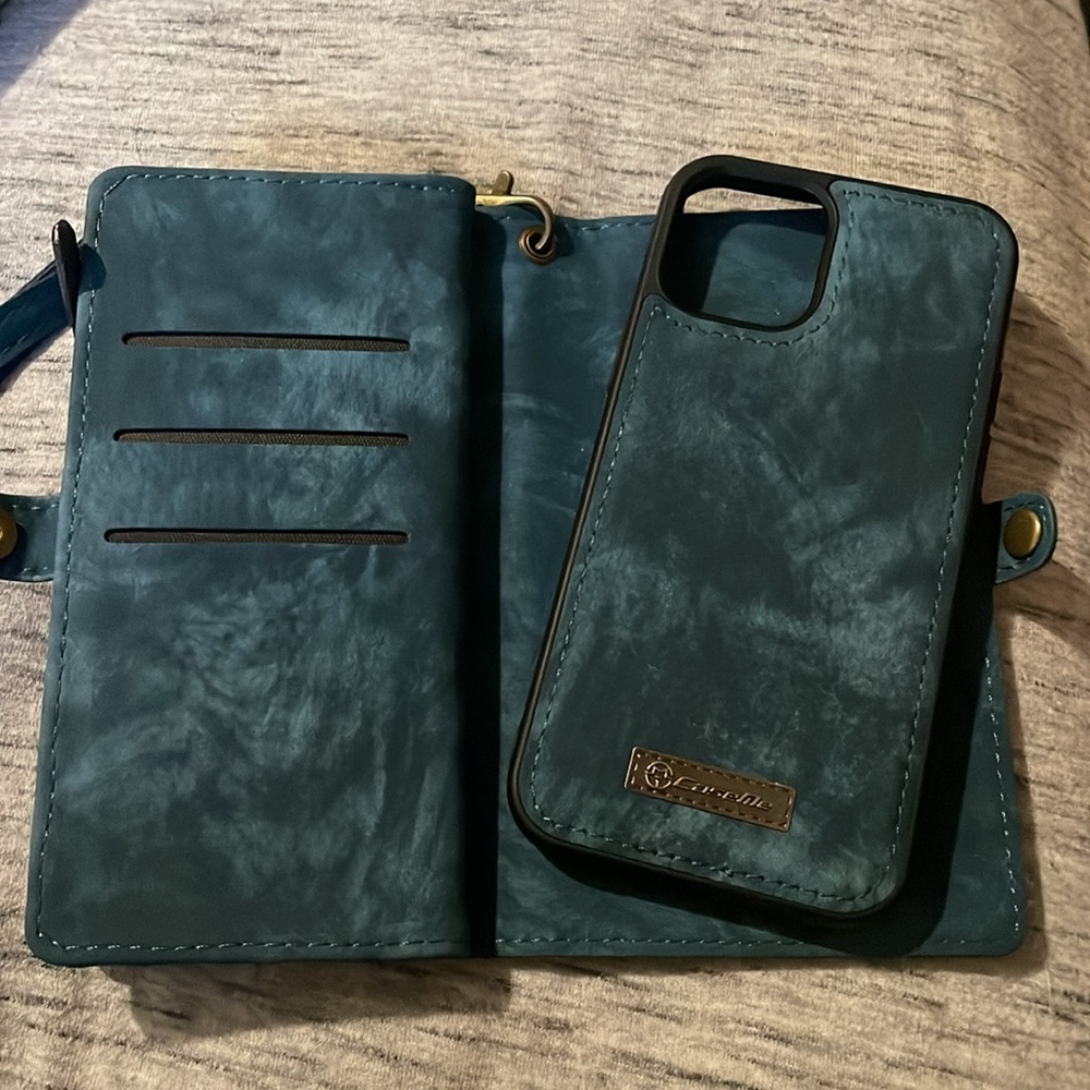 Brand new Iphone 12 pro PU leather style 2 in 1 magnetic phone holder/wallet!
